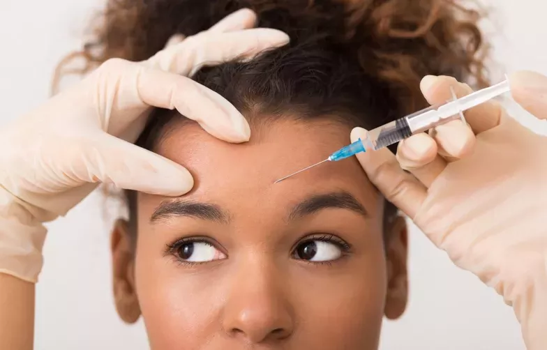 Woman getting an injection