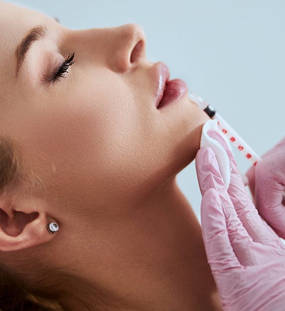 Woman getting a lip injection