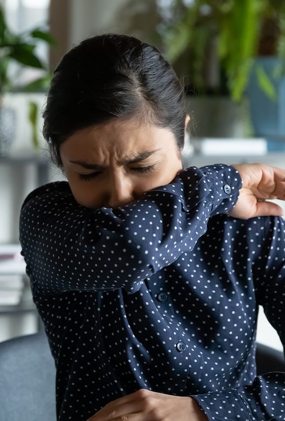 Woman coughing