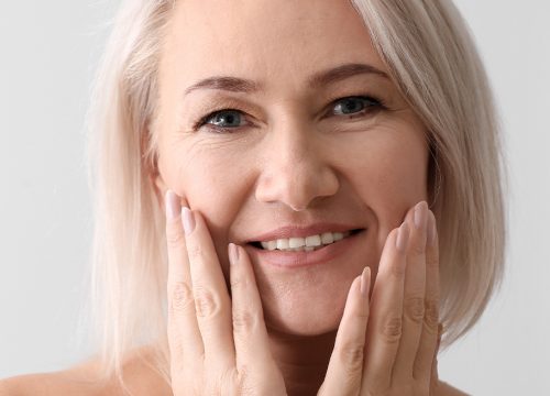 Older woman with a youthful look after Sculptra® treatments