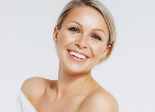 Woman with beautiful skin after laser and red light therapy